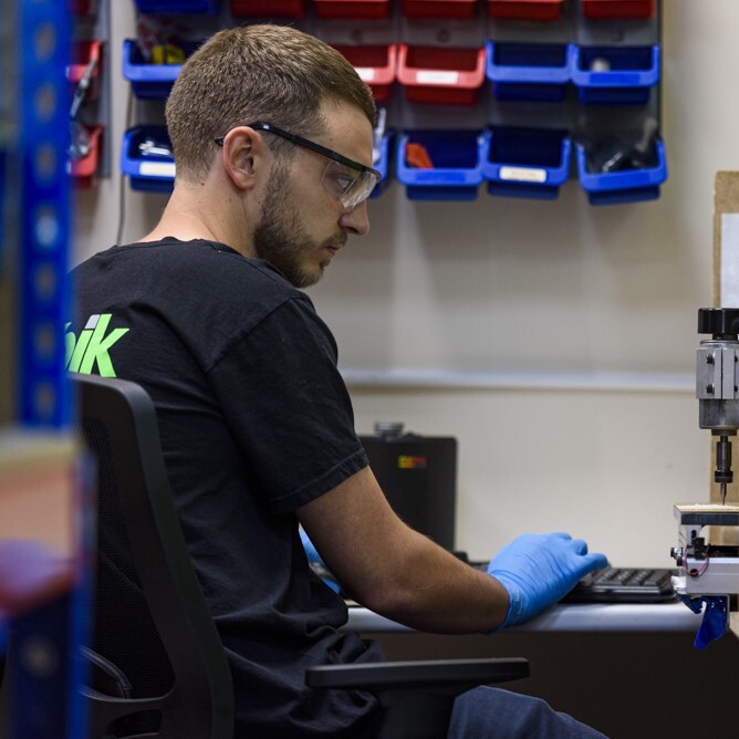 Electronic product engineer working on a computer